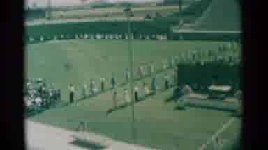South Dakota (1959): Rows Of People Standing In Lines On A Football Field On A