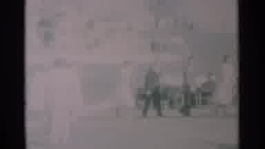 South Dakota (1959): Six People Walking In Single File Line On A Sunny Day