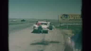 South Dakota (1959): People Walking Around The South Dakota Border Sign