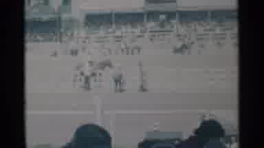 Cheyenne Wyoming (1960): A Horse Back Racer Putting His Pants On