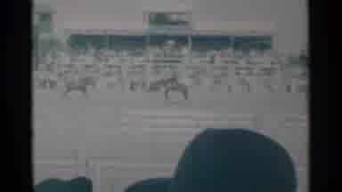 Cheyenne Wyoming (1960): Rodeo Riders Ride Bucking Broncos At A Rodeo