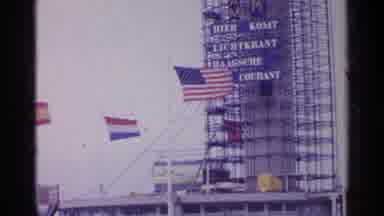 GERMANY-1961: Ship Deck With Multiple International Flags and Haagsche Courant Sign