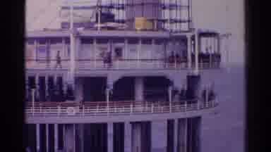 Germany (1961): Waterfront Building With People Hanging Out On A Sunny Day