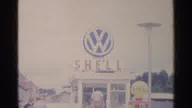 Germany (1961): People At An Old Volkswagen Shell Station Filling Their Cars With