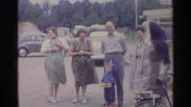 Germany (1961): A Bunch Of People All Standing Together Laughing Together Happy