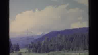 Germany (1961): Mountains Green Trees And White Clouds On A Clear Sunny Day