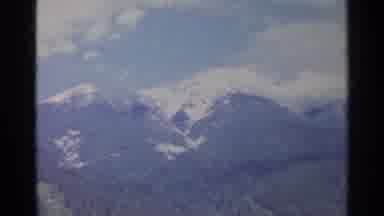 Germany (1961): Snow-Capped Mountains Are Behind A Valley With A Blue Sky Above