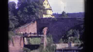 Germany (1961): Man Crossing Bridge Near Narrow Highway Below Oriental
