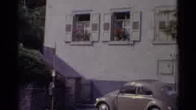 Germany (1961): Old Two Classic Cars Parked On Sidewalk In A City Or Town