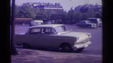 Paris France-1961: White Car Parked At Curb On A Clear Day