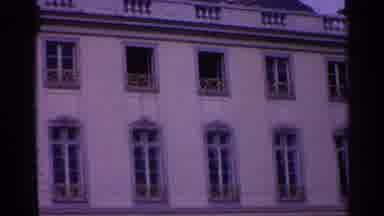 Switzerland (1961): Camera Pans Across The Building And Captures The Details Of