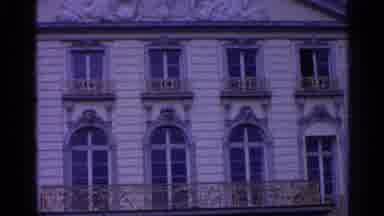 SWITZERLAND-1961: Ornate European Building with Classical Columns and Balconies