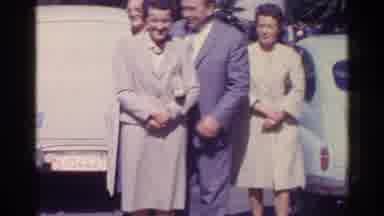 Switzerland (1961): Families Smiling Walking And Observing A Tall Tower