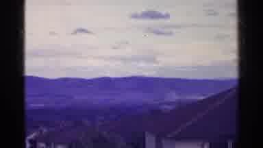 Switzerland (1961): A A Bunch Of Very Pretty Mountains With A Town Below It