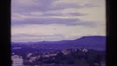 SWITZERLAND-1961: Panoramic View Of Valley Town And Mountains
