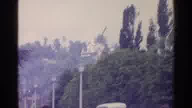 Switzerland (1961): Water Fountain Near Trees And Street With Cars And Highlights