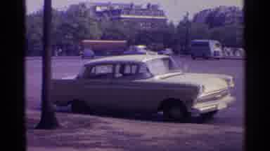 SWITZERLAND-1961: Classic White Sedan on a 1960s Swiss Street