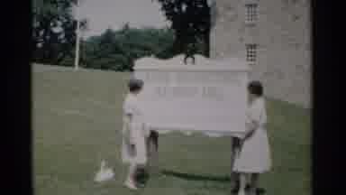 Jamestown Virginia (1962): Two Young Girl Walk With A Basket Of Food In A Meadow