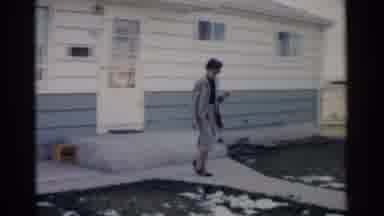 Washington DC (1962): A Woman Walking Down The Sidewalk From A Building Seemingly