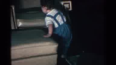 Kentucky USA (1963): The Baby Is Trying To Climb Into The Chair