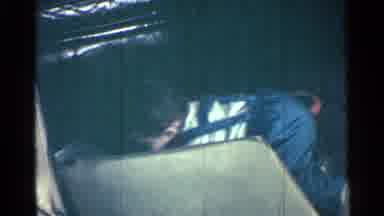Kentucky USA (1963): Little Boy In Casual Attire Pulling Himself Up Onto A Chair