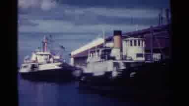 Nassau Bahamas (1963): Docked Boats Near Red Working Site With Workers In Front