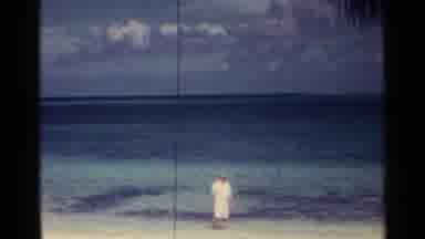 Nassau Bahamas (1963): A Man Standing Near Crystal Blue Ocean With No One Around