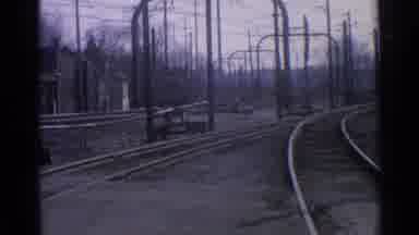 OHIO USA-1965: Camera Panning Across Barren Empty Train Yard During The Day