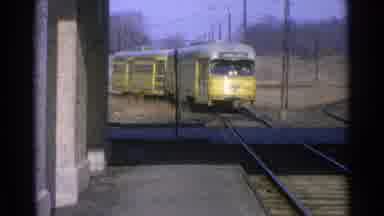 Ohio USA (1965): Approaching Yellow Electric Train On A Clear Day