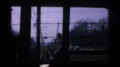 Ohio USA (1965): Yellow Electric Trolley Train On A Cloudy Day