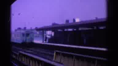 Ohio USA (1965): I Train Station During The Day With Parked And Moving Trains