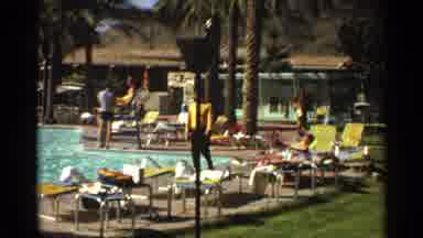 Scottsdale Arizona (1968): Man Wearing Yellow Shirt Walks By Swimming Pool On A