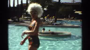 Scottsdale Arizona (1968): Two People In The Distance Walk Beside A Building A