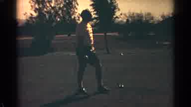 Scottsdale Arizona (1968): Man Pulling Back A Golf Club As He Swings To Hit The