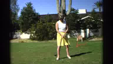 Scottsdale Arizona (1968): Woman Golfer Swinging On Green Cactus Condo House