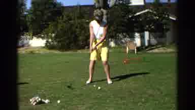 Scottsdale Arizona (1968): A Person Holding A Golf Club Pulls It Back And Begins