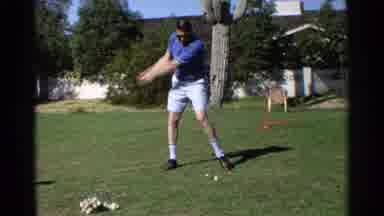 Scottsdale Arizona (1968): A Man Getting Ready Swinging And Hitting A Golf Ball