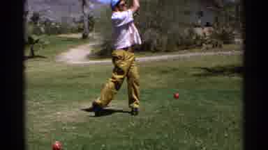 Scottsdale Arizona (1968): Man Swinging Golf Club On Golf Course On Sunny Day Palm
