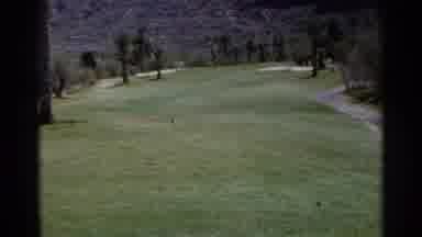Scottsdale Arizona (1968): A Man Golfs At A Golf Course In A Tropical Location