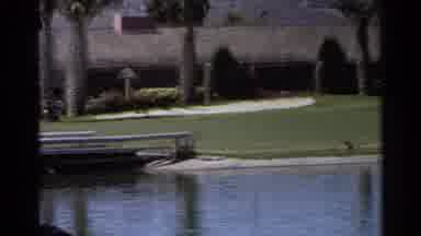 Scottsdale Arizona (1968): Person Golfing Trying To Hit Ball Over Small Pond
