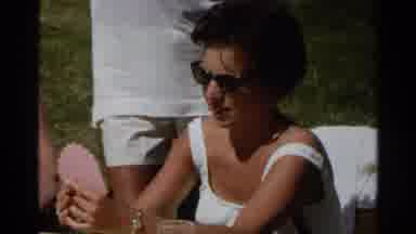 Scottsdale Arizona (1968): Camera Zooms In On Woman Then Zooms In On An Airplane