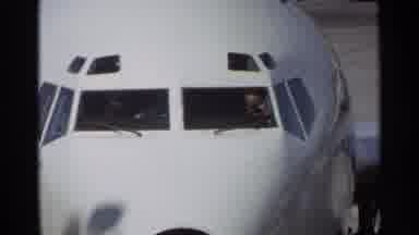 Scottsdale Arizona (1968): White Airplane With Red Stripes And Black Front