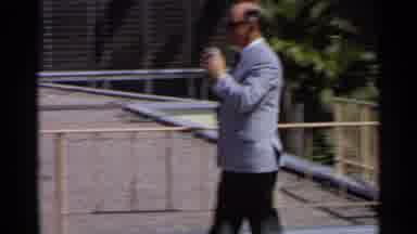 Scottsdale Arizona (1968): Man In Business Attire Backs Up To Take Photograph Of