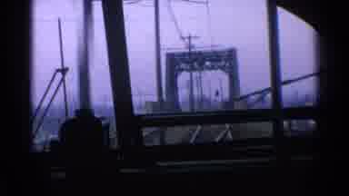 Chicago Illinois (1976): View From A Moving Train Passing Past Power lines Under A