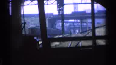 Chicago Illinois (1976): A Train Glides Along A Track In A City
