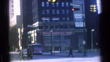 Chicago Illinois (1976): Tall Buildings Around Town People Walking And Buses Are