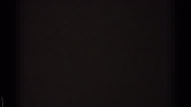 Chicago Illinois (1976): A Short Railroad Cart Driving On The Railroad Tracks