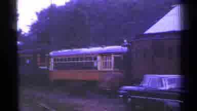 Connecticut USA (1953): Grey And Yellow Train Cars On A Cloudy Day