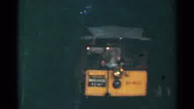 Connecticut USA (1953): Yellow Trolley Moving Into A Dark Tunnel During The Day