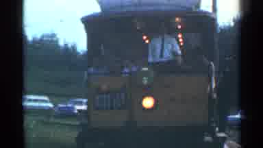 Connecticut USA (1953): Person Riding Yellow Trolley Car On A Sunny Day